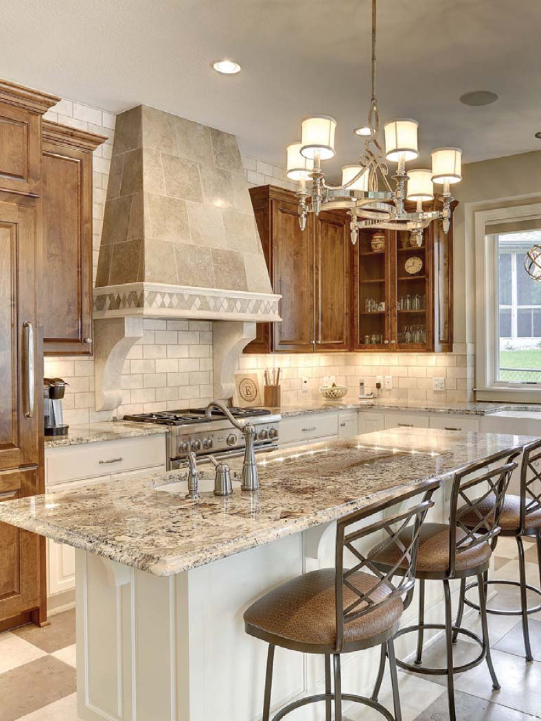 A kitchen with a marble countertop and chairs, perfect for local residential restoration services.