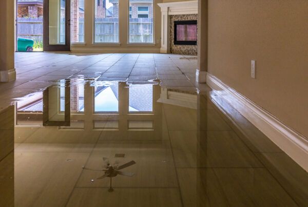 Flooded living room. A water mitigation company cleans up flooded homes such as this one.